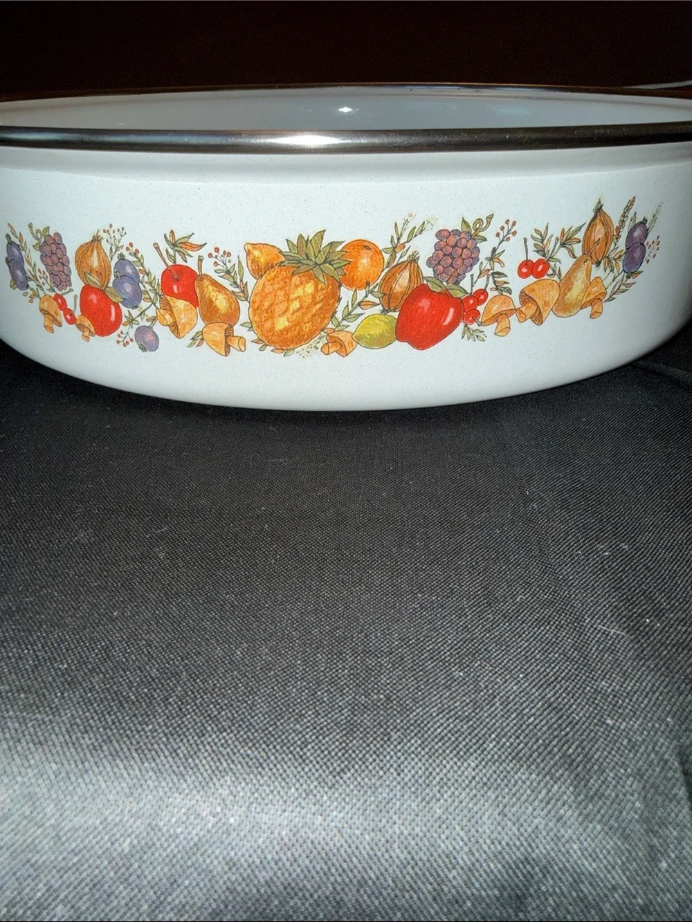 1970s enamelware skillet  featuring a retro “Spice of Life” motif.